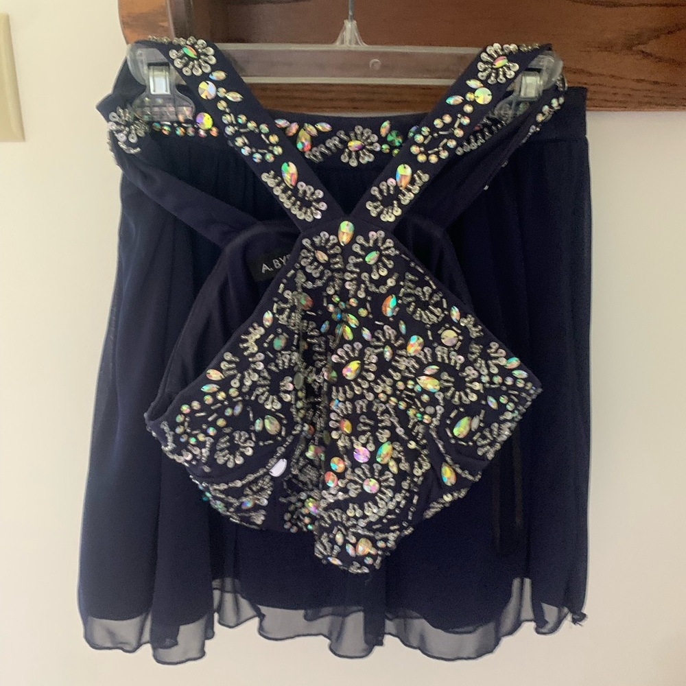 A. Byer Two- Piece Jeweled Blue Mini Dress. Top is Size 7; Bottom is Size 9.